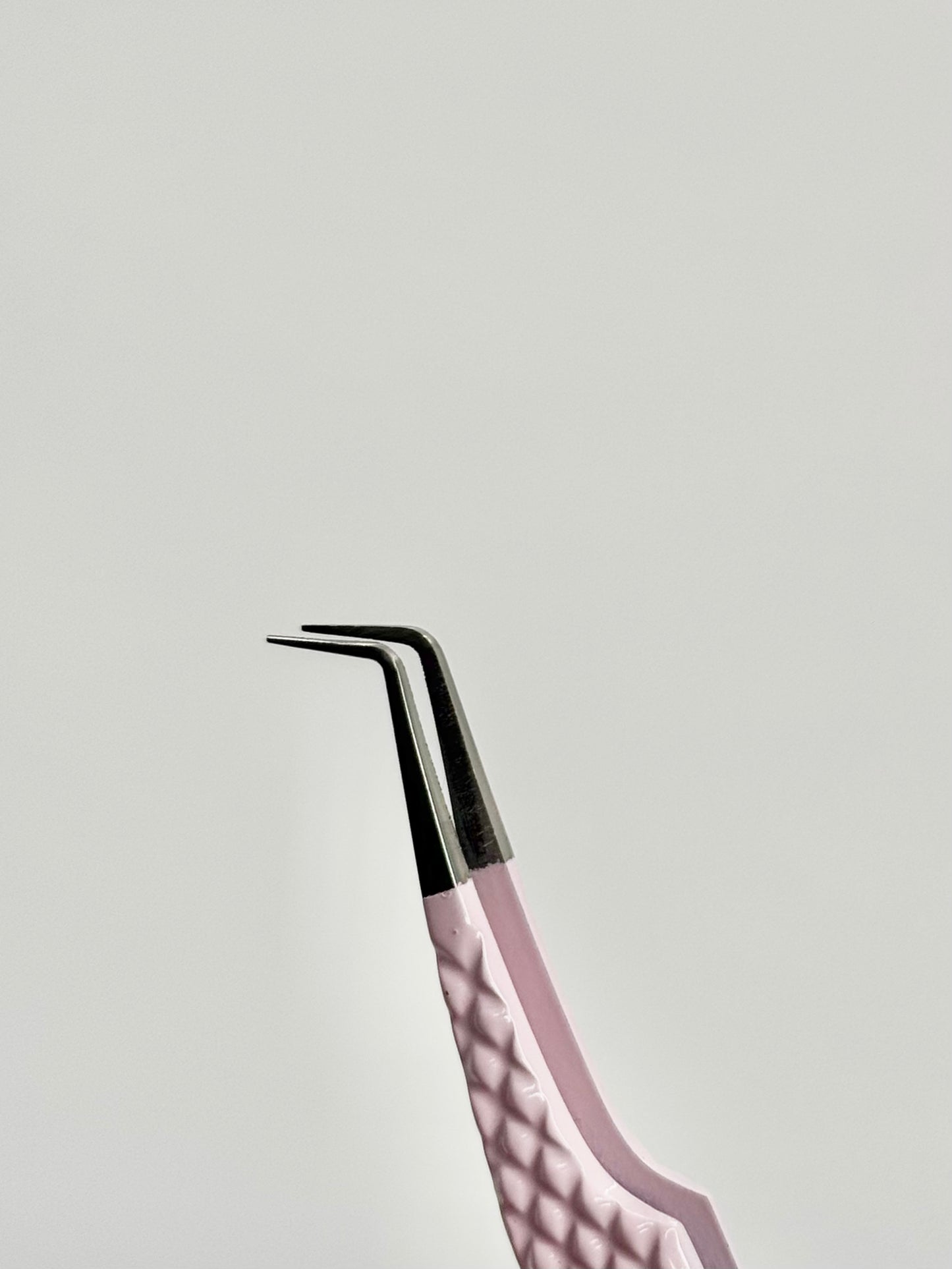 Light pink tweezer w/ charm